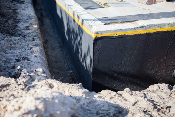 Professional Wet Basement Repair technician working in Midland, OH